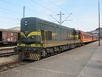 A Makedonski Železnici passenger train pulled by a class 661 locomotive at Veles, Macedonia, in 2010