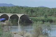 The Gila River flows freely through the breached dam.