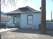 The Pete Romo House was built in 1913 and is located at 753 E. Pierce St. Pete Romo owned a butcher shop on Washington Street, near the Ramona Theater in the 1920s. This property is recognized as historic by the Hispanic American Historic Property Survey of the City of Phoenix. The house is part of the Garfield Historic District which is listed in the National Register of Historic Places reference number: #10000325.