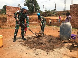 MONUSCO assist in building walls for a church in 2021