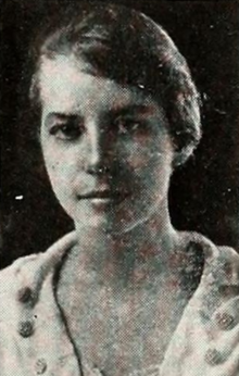 A young white woman with short hair