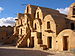 multi-storey stone houses with steps to doors