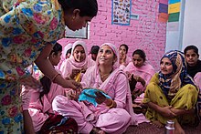 A Sewing lesson for women in an empowerment center.