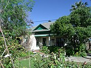 Harry Walker House (as it looks today) was built in 1903 and is located at 118 E. 7th Street. The architectural style: Neo-Colonial Influence. It was listed in the National Register of Historic Places on May 7, 1984 reference #84000745.