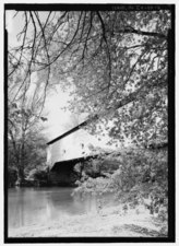 Exterior view of Southwest side of bridge from South bank of Sugar Creek