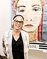 Ukrainian-American painter Ola Rondiak at the opening of an exhibition "Metamorphosis"