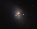 NGC 1222 contains three compact regions.[31]
