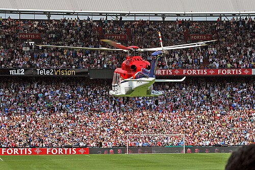 A helicopter lands at the Feijenoord Stadion to introduce new signings to the fans