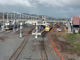 A railway station with construction works on the right