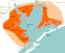 The coastline of the Gulf of Mexico runs northeast to southwest with the Galveston Bay an irregularly shaped inlet covering the upper left of the map. The bayside communities are highlighted with major towns such as Pasadena, Baytown, and Texas City explicitly labeled. Houston is labeled in the far northwest of the drawing.