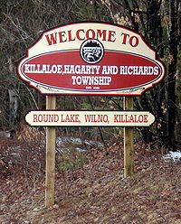 Welcome sign on Round Lake Road