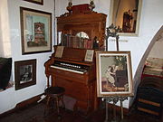 Early 19th century organ in the main room of Squaw Peak Inn.