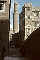 Houses in old Sana'a. Ibex and Bull were sacred animals in ancient Yemen. Yemenis put Ibex or Bull horns at top of houses to protect from evil eyes.[79]