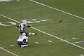 Adam Vinatieri warms up before the game