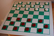Standard checkers set and board