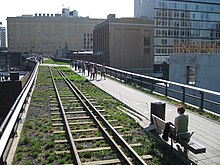 Railway tracks and the walking path cross 20th Street