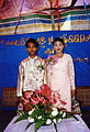 Couple dressed in traditional Burmese outfits