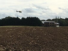 Police helicopter landing at former RAF Husbands Bosworth (2019)