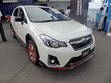 Subaru XV Hybrid tS, a high-performance variant of the Subaru XV Hybrid. This photo shows the front of the car, which is white with a small "STI" emblem on the front grille.