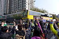 2015年2月8日，光复屯门[29]示威者向城巴B3X线巴士上的中国大陆乘客竖中指。