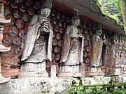 Southern Song Dynasty (1127–1279 CE) cliff carving of Vairocana (centre), with Manjushri (left), and Samantabhadra (right) among the Dazu Rock Carvings at Mount Baoding, Dazu District, Chongqing, China