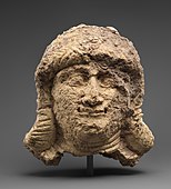 Female head; circa 2000–1600 BC; ceramic; 18 x 12.7 cm; Metropolitan Museum of Art (New York City)