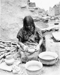 A Hopi woman of Oraibi, Third Mesa, making coiled pottery