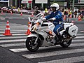 A Tokyo Metropolitan Police Department motorcycle officer on a Yamaha FJR1300 during the 2015 Tokyo Marathon