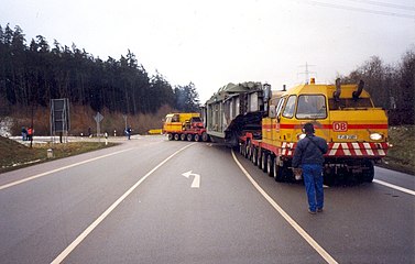 Onward transportation of the large transformer by road to the electricity substation