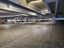 Interior view of a parking garage with no vehicles