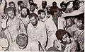 Image 21The surviving insurgents of the seizure of the Grand Mosque, 1979 under custody of Saudi authorities, c. 1980. (from History of Saudi Arabia)