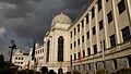 Museum building against cloudy backdrop