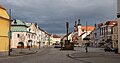 Chomutov, view to Náměstí 1. Máje and in the front the sculpture (sloup se sousoším Nejsvětější Trojic)