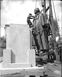 Installing the statue of George Washington that remains on the University of Washington campus