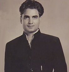 Black-and-white portrait of Amrohi looking directly at the camera