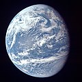 Image 7A view of Earth with its global ocean and cloud cover, which dominate Earth's surface and hydrosphere; at Earth's polar regions, its hydrosphere forms larger areas of ice cover. (from Earth)