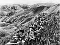 Image 3Australian soldiers resting in the Finisterre Ranges of New Guinea while en route to the front line (from New Guinea)