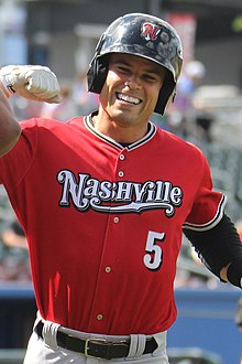 A baseball player in red