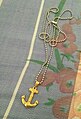 Anchored cross necklace