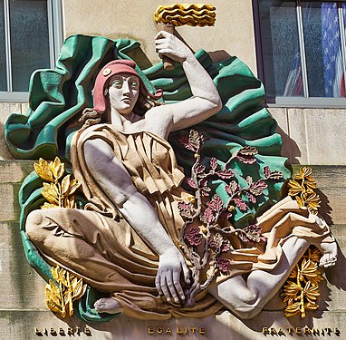 This sculpture by Alfred Janniot sits above the bronze engraving of the Rockefeller Center's Maison Francaise on Fifth Avenue. It reads "Liberté, Egalité, Fraternité" (Liberty, Equality, Fraternity).