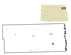 Location of Minto, North Dakota. (The upper map is the state of North Dakota with Walsh County in red; the lower map is Walsh County with Minto in red.)