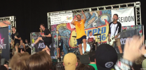 Roam performing on Warped Tour in Hartford, CT in 2016. From left to right Sam Veness, Matt Roskilly, Alex Costello, Miles Gill, and Alex Adam.