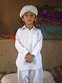 Baloch child in Balochi men's clothes