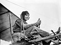 Image 13 Hélène Dutrieu Photo credit: Bain News Service Hélène Dutrieu, shown here in her aeroplane ca. 1911, was the fourth woman in the world (the first from Belgium) to earn a pilot's license and reputedly the first woman to carry passengers and to fly a seaplane. Besides being a pilot, she was a cycling world champion, stunt cyclist, stunt motorcyclist, automobile racer, wartime ambulance driver, and director of a military hospital. More selected pictures