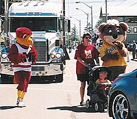 Zeddy, on the far right, is walking in a parade in 2003.