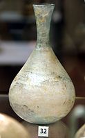 Archaeological Museum in Milan, (Italy). Vaults, collection of Ancient Roman glassware, third glass case. A bottle dating from the 2nd/3rd century AD.