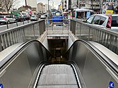 Entrance with an escalator at Villejuif–Léo Lagrange