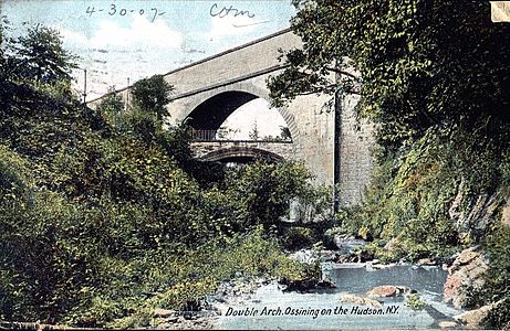 Two arched bridges cross Sing Sing Kill in Ossining. Broadway is carried on the lower bridge, while the Croton Aqueduct was carried on the upper one