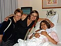 Midwife assisting with home birth