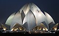 Designed in the pattern of a lotus flower, the Bahá'í House of Worship in Delhi is noted as one of the "most outstanding structures of the twentieth century" and attracts millions of visitors every year.<ref>{{cite book